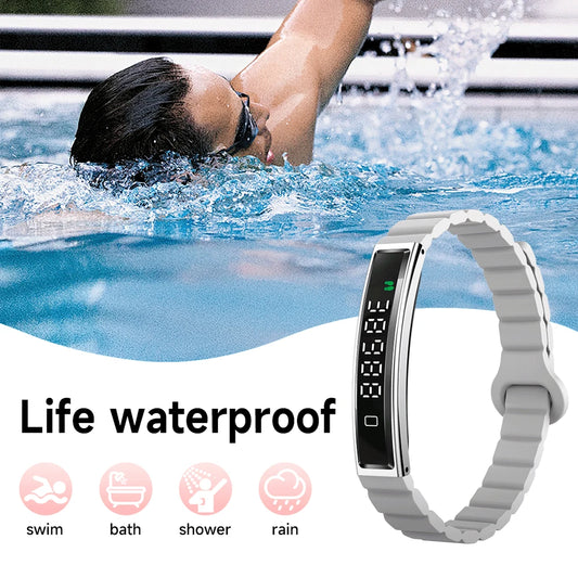 Person swimming with a digital watch on wrist, emphasizing water resistance features.
