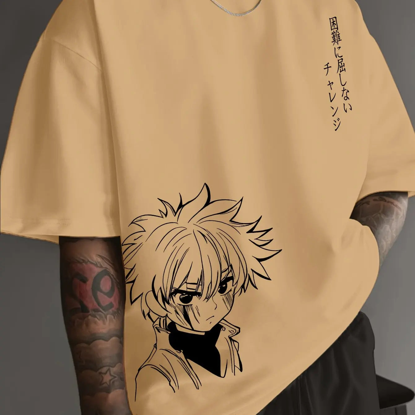 Beige t-shirt with an anime character design and text on a dark background