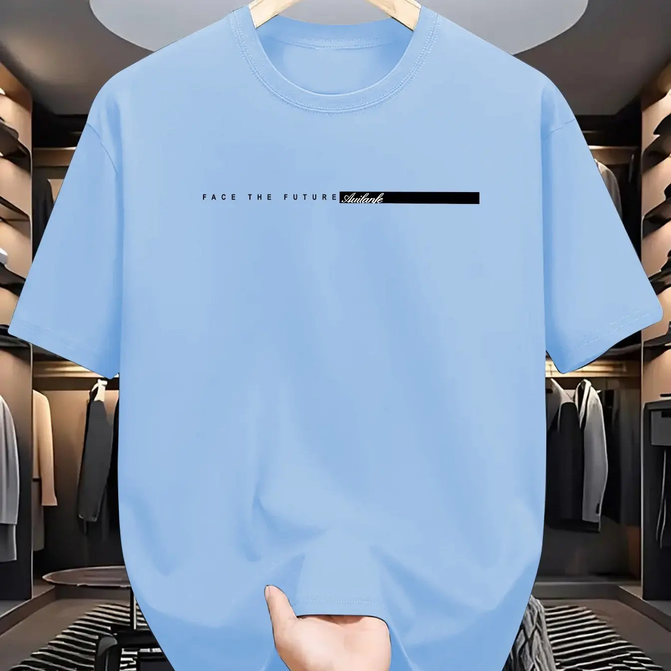 Light blue t-shirt with text on a hanger in a clothing store.