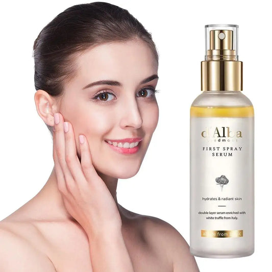 Woman touching her face with a bottle of 'dAlba' serum on a white background