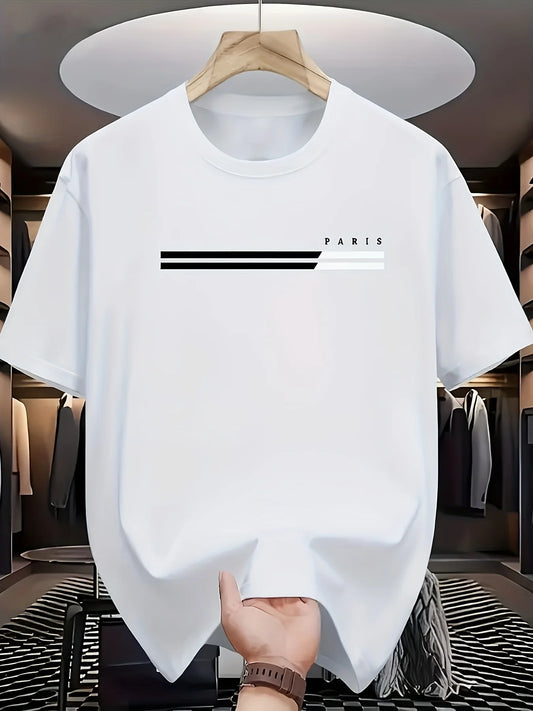 White t-shirt with 'PARIS' print on a hanger in a clothing store.